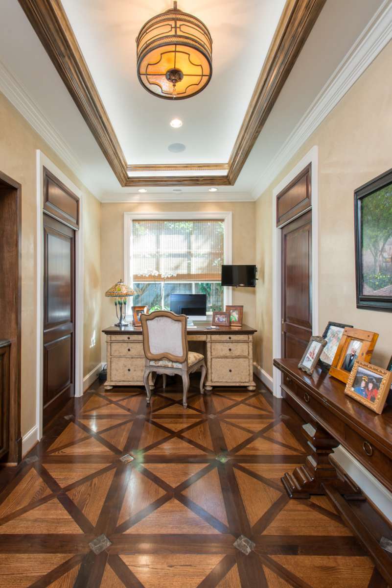 wood inlay floor in master bathroom addition in preston hollow